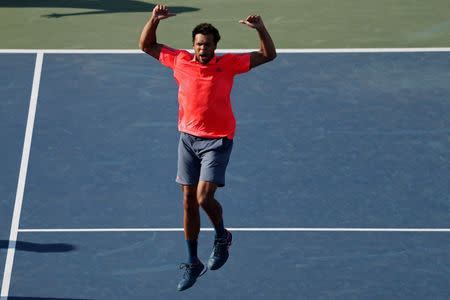 Sep 4, 2016; New York, NY, USA; Jo-Wilfried Tsonga of France celebrates after his match against Jack Sock of the United States (not pictured) on day seven of the 2016 U.S. Open tennis tournament at USTA Billie Jean King National Tennis Center. Tsonga won 6-3, 6-3, 6-7(7), 6-2. Mandatory Credit: Geoff Burke-USA TODAY Sports