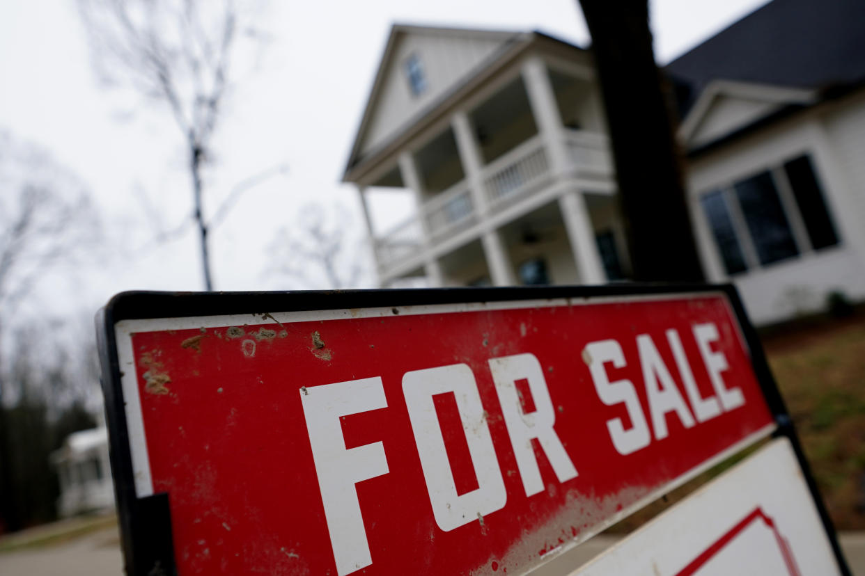 FILE - In this Thursday, Feb. 18, 2021 file photo, a new home is for sale in Madison, Ga. Mortgage rates fell for the third straight week, dipping below 3% for the first time in two months. Mortgage buyer Freddie Mac reported Thursday, April 22 that the benchmark 30-year home-loan rate declined to 2.97% this week from 3.04% last week. (AP Photo/John Bazemore, File)