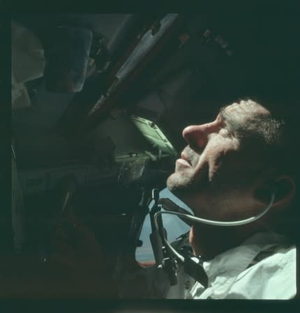 FILE PHOTO: Astronaut Walter Cunningham, Apollo 7 lunar module pilot, is photographed during the Apollo 7 mission in this NASA handout photo