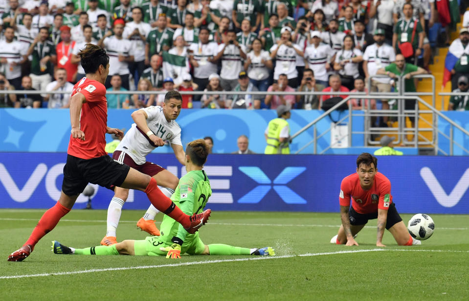 <p>Mexico’s Javier Hernandez, second left, scores his side’s second goal. </p>