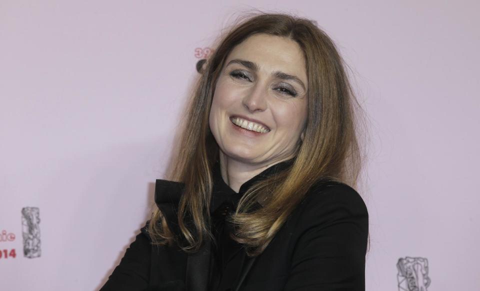 French actress Julie Gayet arrives at the 39th French Cesar Awards Ceremony, in Paris, Friday Feb. 28, 2014. This annual ceremony is presented by the French Academy of Cinema Arts and Techniques. (AP Photo/Lionel Cironneau)
