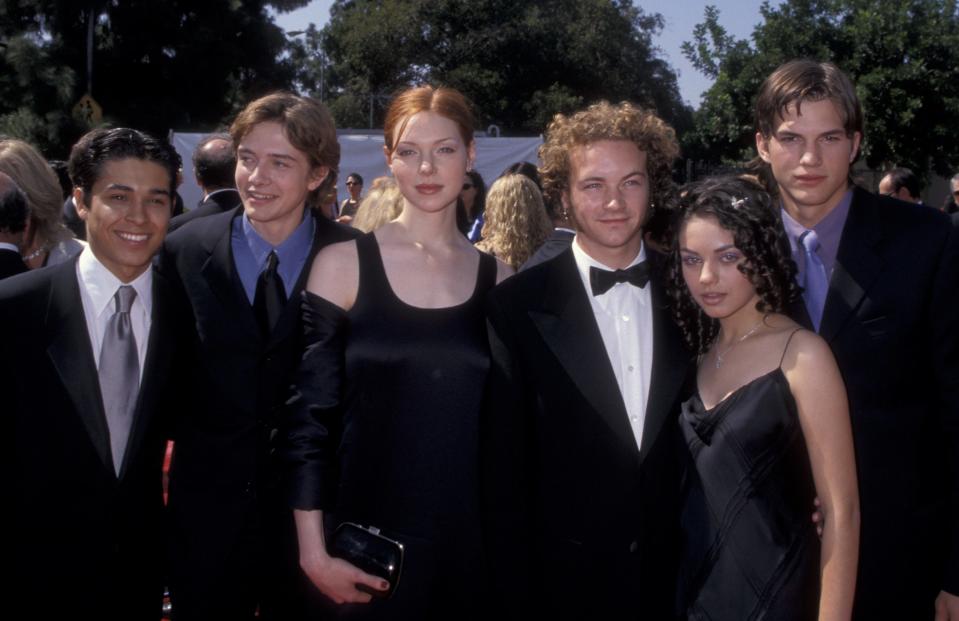 Wilmer Valderrama, Topher Grace, Laura Prepon, Danny Masterson, Mila Kunis, and Ashton Kutcher at the Emmys in 1998.