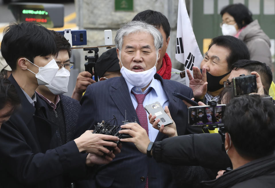 In this April 20, 2020, photo, Sarang Jeil Church pastor Jun Kwang-hun speaks outside a detention center in Uiwang, South Korea. Jun who has been a bitter critic of the country's president has tested positive for the coronavirus health authorities said Monday, Aug. 17, two days after he participated in an anti-government rally in Seoul that drew thousands. (Ko Jun-beom/Newsis via AP)