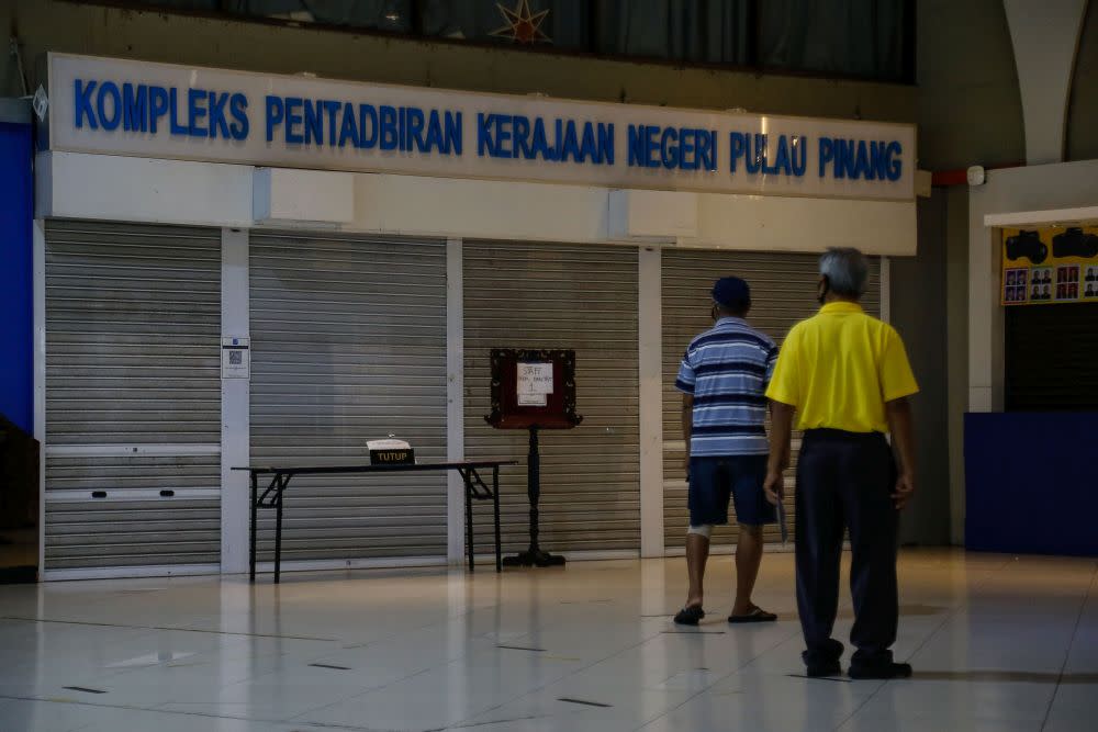 A notice informing the public of the Penang state government offices' closure  is pictured at Komtar, George Town August 12, 2021. — Picture by Sayuti Zainudin