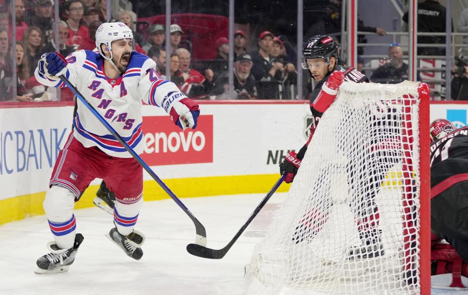 RALEIGH, NORTH CAROLINA - MAY 16: Chris Kreider #20 of the New York Rangers celebrates a goal against the Carolina Hurricanes during the third period in Game Six of the Second Round of the 2024 Stanley Cup Playoffs at PNC Arena on May 16, 2024 in Raleigh, North Carolina.