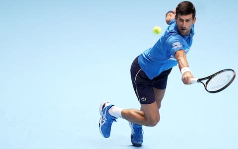 Novak Djokovic - Novak Djokovic brushes aside young pretender Matteo Berrettini to lay down marker on opening day at ATP Finals - Credit: PA