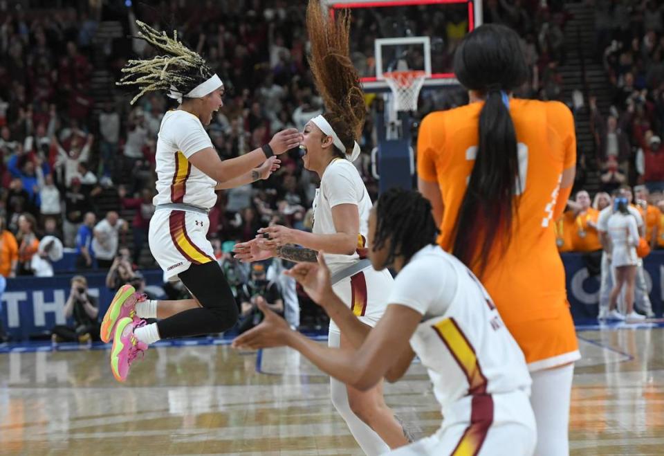 South Carolina’s Kamilla Cardoso, center, celebrates making the game-winning shot against Tennessee with teammate Te-Hina Paopao, left, in the SEC Tournament semifinals at the Bon Secours Wellness Arena in Greenville, South Carolina. South Carolina went on to win the SEC Tournament title and enters the NCAA Tournament with a 32-0 record.