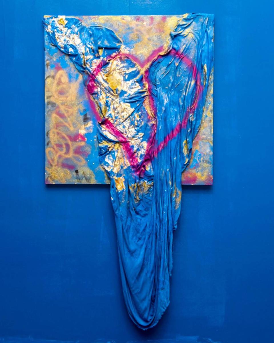 Artwork entitled ‘Draped in Love’ by artist Alicia Bailey is displayed at the Art Prizm Fair during Miami Art Week in the Design District neighborhood of, Florida, on Tuesday, November 29, 2022.