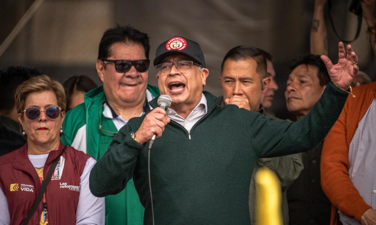 <span>Gustvo Petro at the workers’ rally in Bogotá on Wednesday.</span><span>Photograph: Diego Cuevas/Getty Images</span>