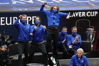 Team Europe players cheer after Casper Ruud, of Norway, defeated Team World's Reilly Opelka, of the USA, at Laver Cup tennis, Friday, Sept. 24, 2021, in Boston. (AP Photo/Elise Amendola)