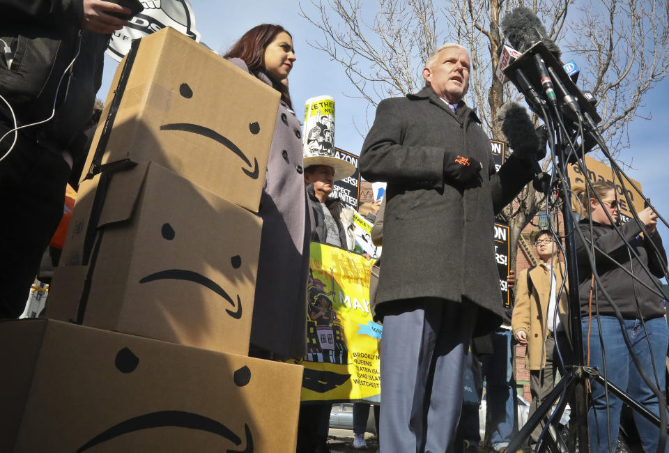 FILE - In this Thursday Feb. 14, 2019, file photo, New York City Councilman Jimmy Van Bramer, center, speaks during a news conference in Gordon Triangle Park in the Queens borough of New York, following Amazon's announcement it would abandon its proposed headquarters for the area. Amid growing concern about the incentives that cities promised Amazon to land its new headquarters, Kentucky lawmakers considered a bill in 2019 to keep the details of Louisville’s failed pitch to the retailer forever secret. (AP Photo/Bebeto Matthews, File)