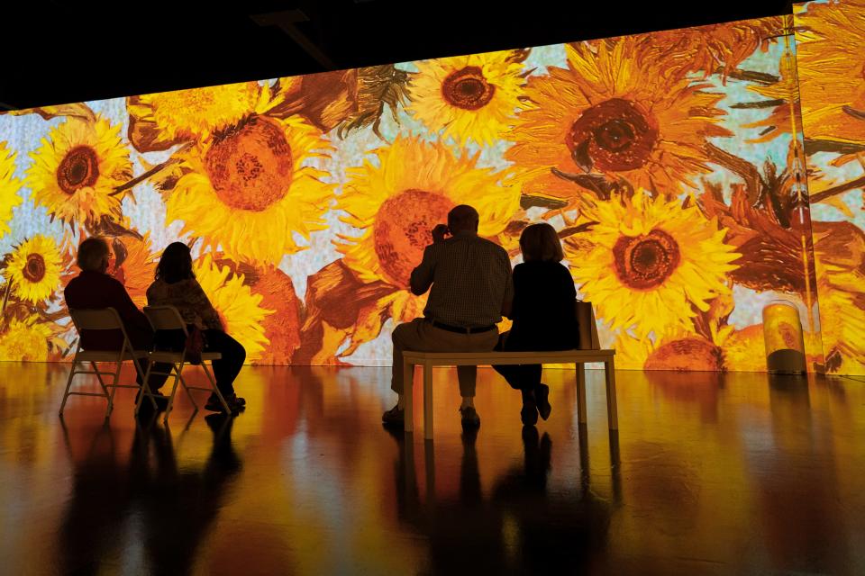 People visit the "Immersive Van Gogh" experience in Minneapolis. The popular art exhibit will make its OKC debut Dec. 14. Photo provided.