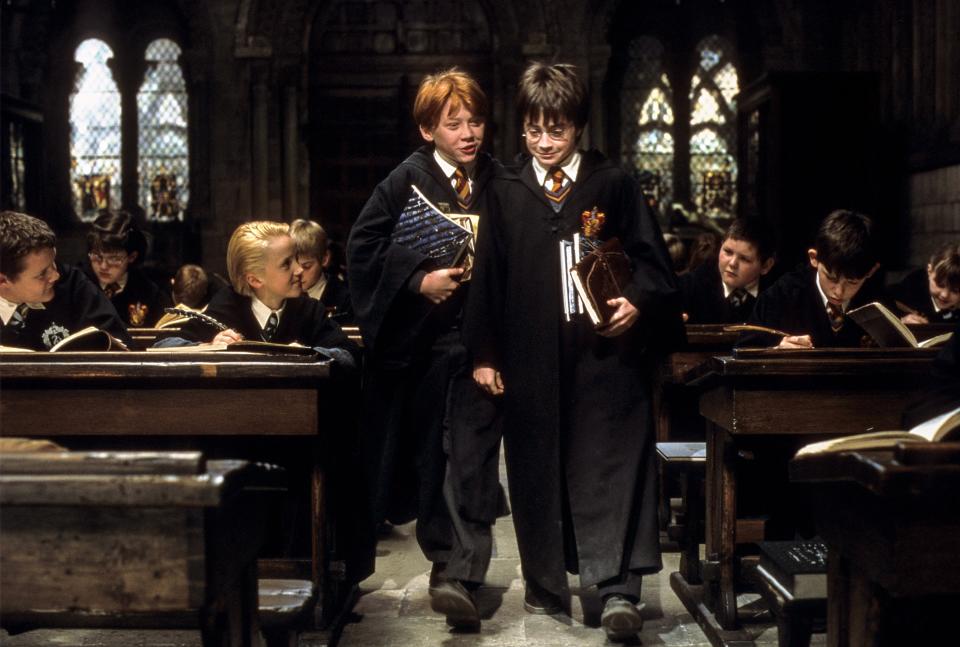HARRY POTTER AND THE SORCERER'S STONE, Tom Felton, Rupert Grint, Daniel Radcliffe, 2001. ph: Peter Mountain / © Warner Bros./ Courtesy: Everett Collection