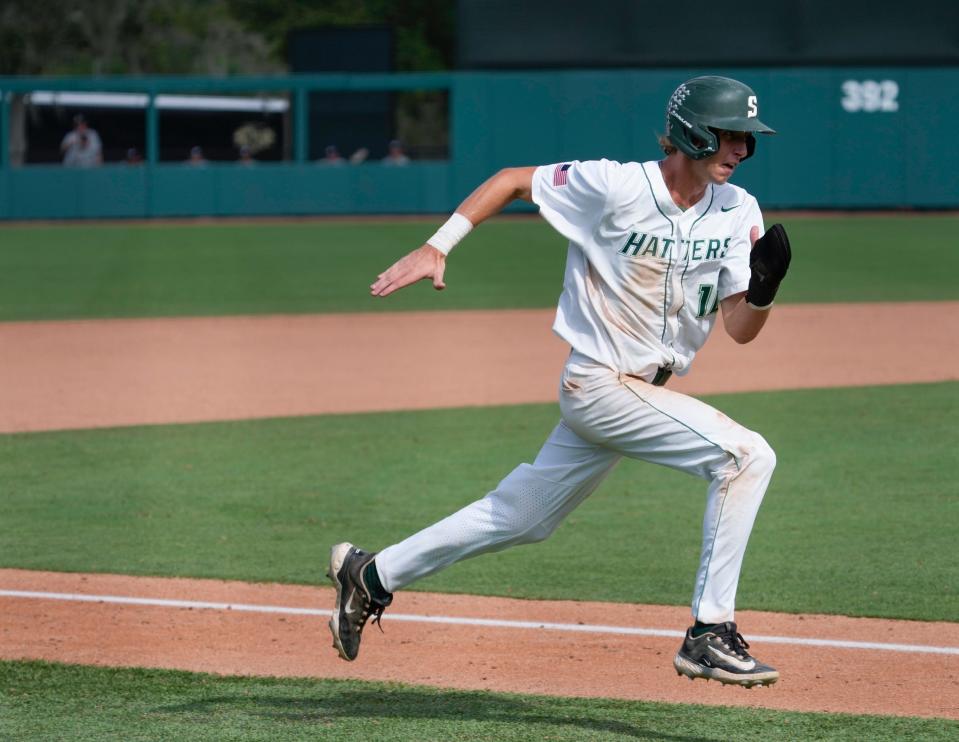 Stetson's Landon Moran races for home to score during a game with Austin Peay at Melching Field in DeLand, Thursday, May 25, 2023. 