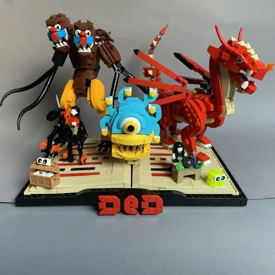 Dungeons u0026 Dragons monsters sitting on an open book made of LEGO