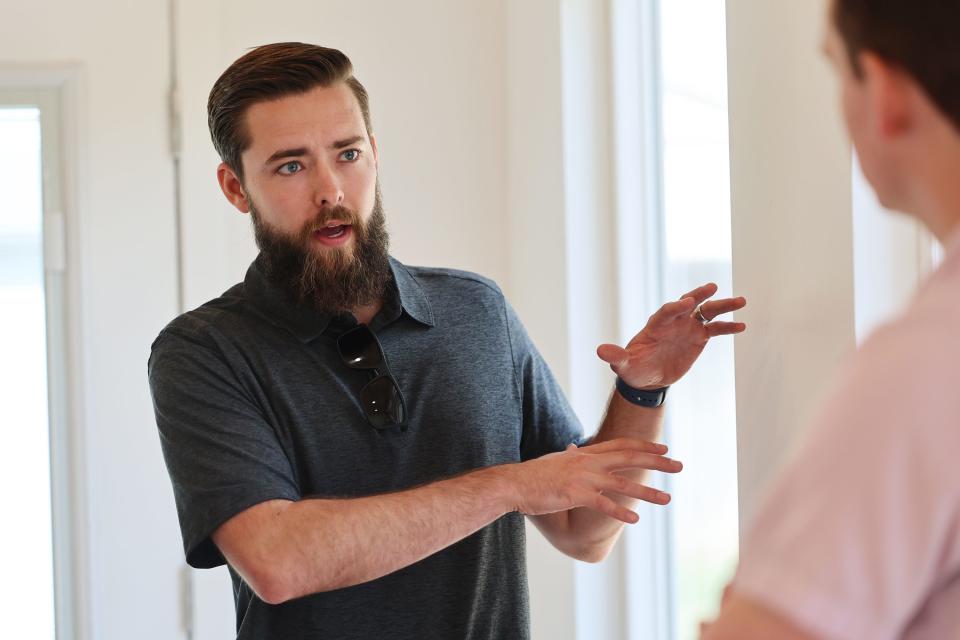 Jonathan Hitzhusen, owner of Backyard Office Utah, talks about his small business while standing in the new office space in the yard of client Sydney Jones on Tuesday, June 20, 2023. Jones’ project was recently completed. | Scott G Winterton, Deseret News