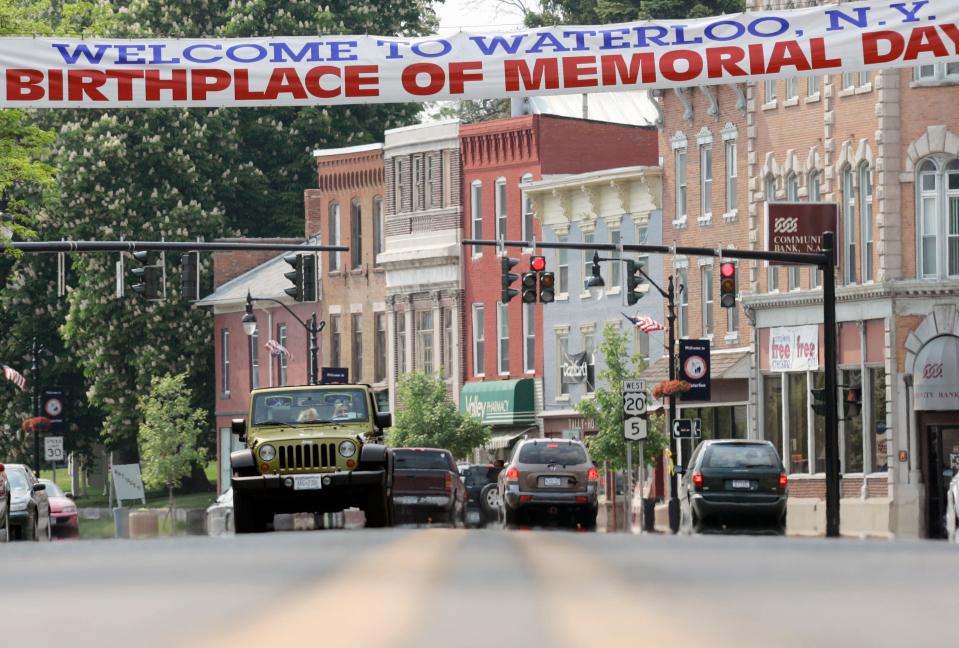 Motorists drive down Main Street in Waterloo, N.Y., Thursday, May 24, 2007. Waterloo is the birthplace of Memorial Day. More than two dozen communities around the United States claim to be the birthplace of Memorial Day.  Yet the official distinction, signed into law by President Johnson in 1966, is held by Waterloo.