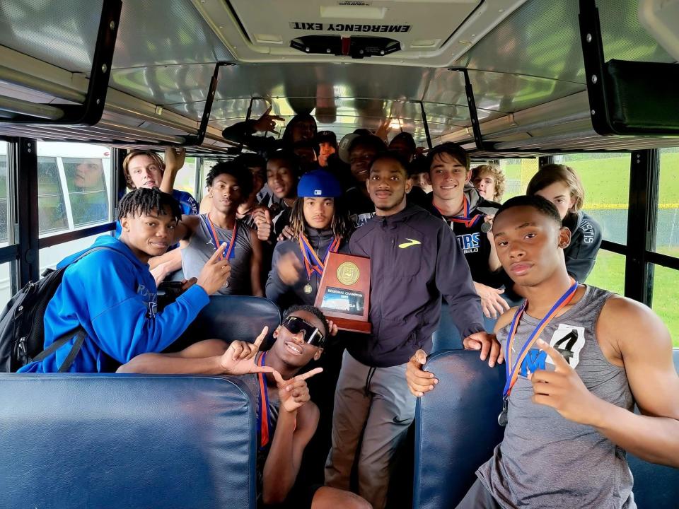 Mountain Island Charter's boys track and field team celebrates its 1A West regional championship won on May 14, 2022.