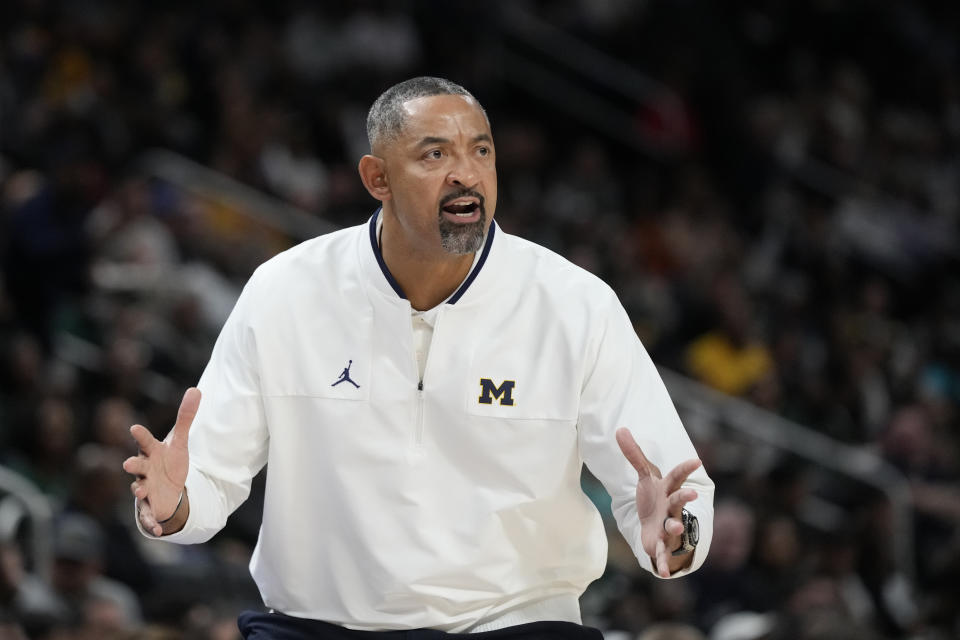 Michigan head coach Juwan Howard yells from the sideline during the first half of an NCAA college basketball game against Eastern Michigan, Friday, Nov. 11, 2022, in Detroit. (AP Photo/Carlos Osorio)