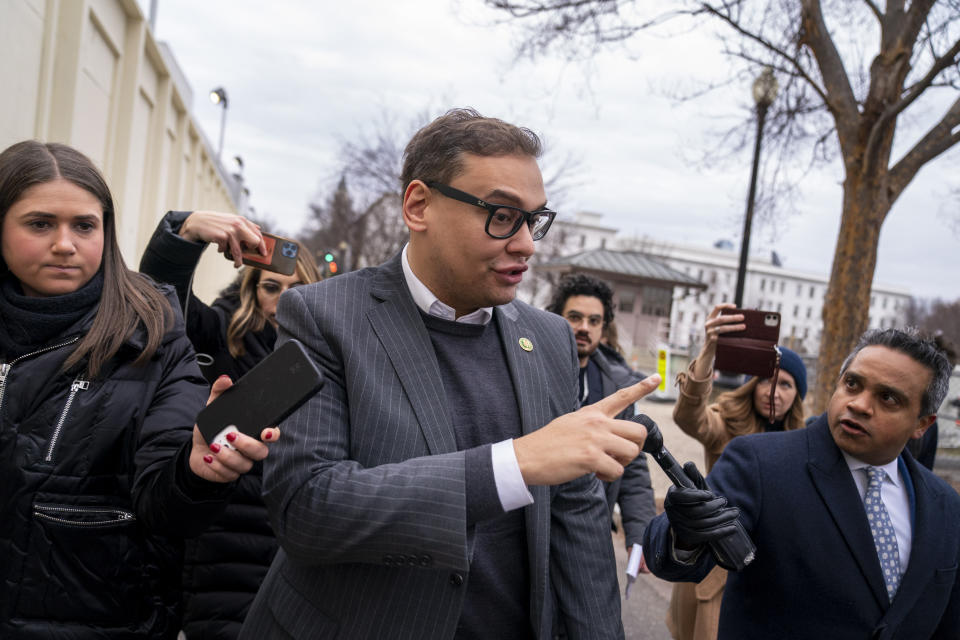 Rep. George Santos, R-N.Y., leaves a House GOP conference meeting on Capitol Hill in Washington, Wednesday, Jan. 25, 2023. (AP Photo/Andrew Harnik)