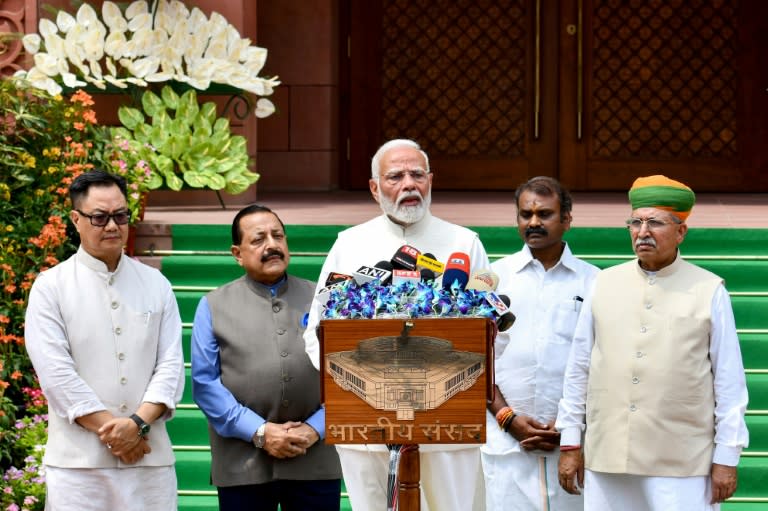 India's Prime Minister Narendra Modi speaks to reporters before the opening of the first parliamentary session since general elections (-)