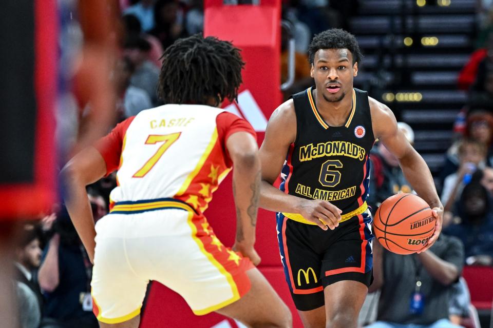 Mar 28, 2023; Houston, TX, USA; McDonald's All American West guard Bronny James (6) dribbles the ball during the first half against the McDonald's All American East at Toyota Center. Mandatory Credit: Maria Lysaker-USA TODAY Sports