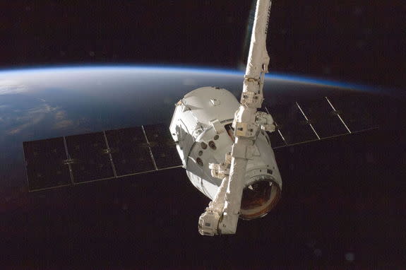 The SpaceX Dragon commercial cargo craft is grappled by the International Space Station's Canadarm2 robotic arm on Oct. 10, 2012 during the spacecraft's first cargo delivery mission for NASA under a $1.6 billion deal for commercial cargo delive