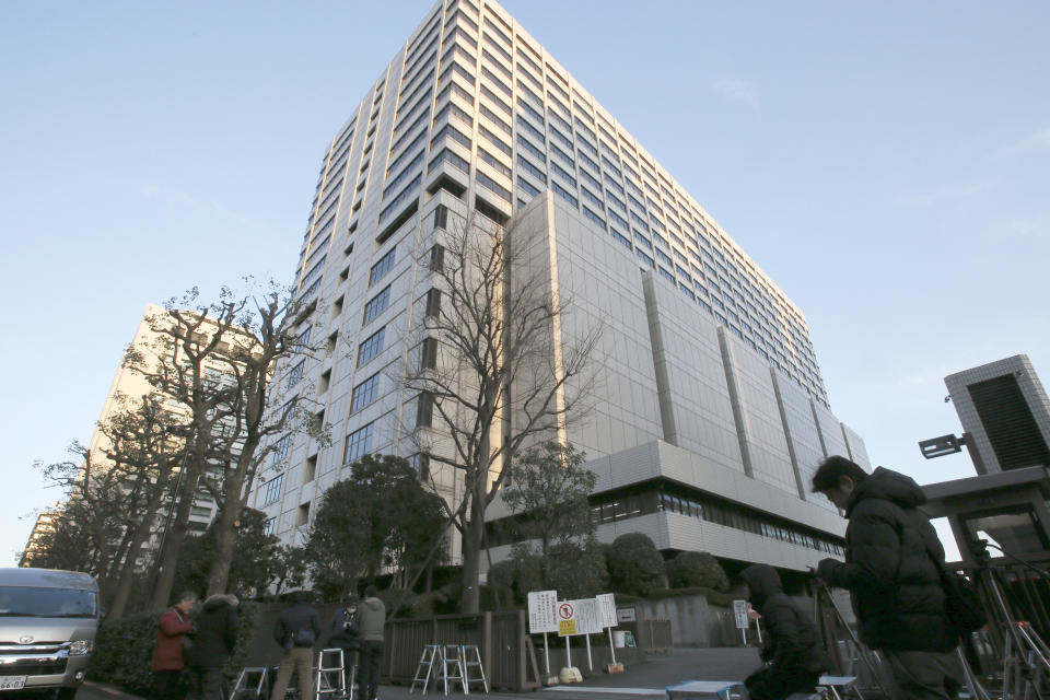 FILE - This Jan. 8, 2019, file photo shows the Tokyo District Court in Tokyo. A worker at the major Japanese sportswear maker Asics says he is suing the company to counter the idea that a man's place is at work and a woman's is in the home. The father of two appeared at a hearing Thursday, Sept. 12, 2019 in the court, which is handling the case on "pata-hara," or paternity harassment. (AP Photo/Shuji Kajiyama, File)