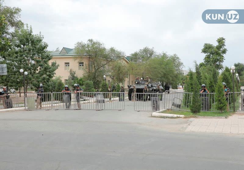 Uzbek law enforcement officers guard a street in Nukus, capital of the northwestern Karakalpakstan region