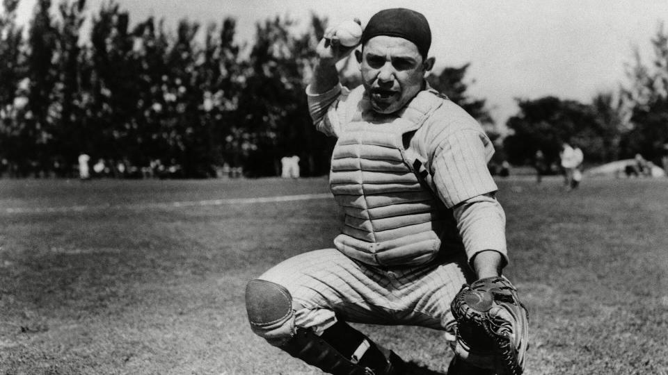 Mandatory Credit: Photo by Harry Harris/AP/Shutterstock (6655130a)Yogi Berra, catcher of the New York Yankees, is shown at the Yanks' spring training camp in St.