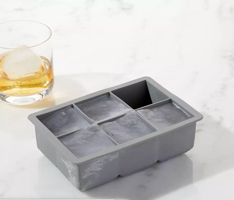 &ldquo;I don&rsquo;t go overboard with specialty ice, but I have trays to make the bigger rocks for an Old Fashioned and the regular 1-by-1 ones as well. Once in a while, I&rsquo;ll bring ice home from the bar. I like to chill my glassware before I serve a drink to guests at home!&rdquo;<br /><br /><strong><a href="https://go.skimresources.com?id=38395X987171&amp;xs=1&amp;url=https%3A%2F%2Fwww.crateandbarrel.com%2Fjumbo-grey-silicone-ice-cube-tray%2Fs294787" target="_blank" rel="noopener noreferrer">Get the Jumbo Grey Silicone Ice Cube Tray for $8.95.</a> </strong>