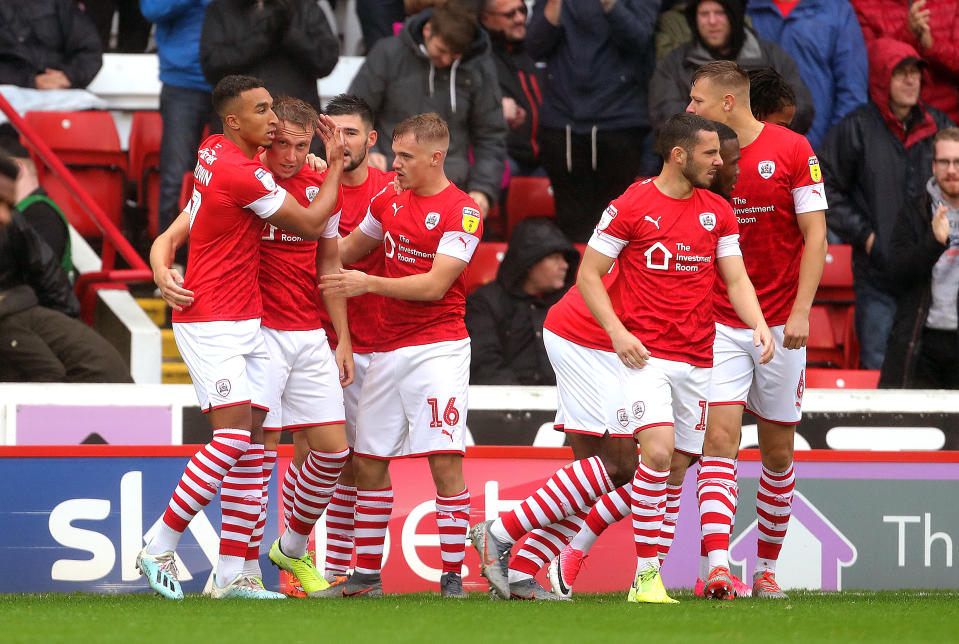 Barnsley's Cauley Woodrow celebrates scoring his side's first goal of the game. (Credit: Getty Images)