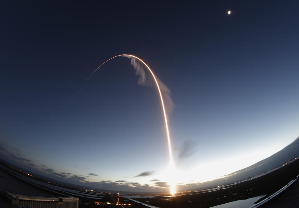 In this long exposure photo, the United Launch Alliance Atlas V rocket carrying the Boeing Starliner crew capsule lifts off on an orbital flight test to the International Space Station from Space Launch Complex 41 at Cape Canaveral Air Force station, Friday, Dec. 20, 2019, in Cape Canaveral, Fla. Boeing's new capsule ended up in the wrong orbit after lifting off on its first test flight Friday, a blow to the company's effort to launch astronauts for NASA next year. (AP Photo/Terry Renna)