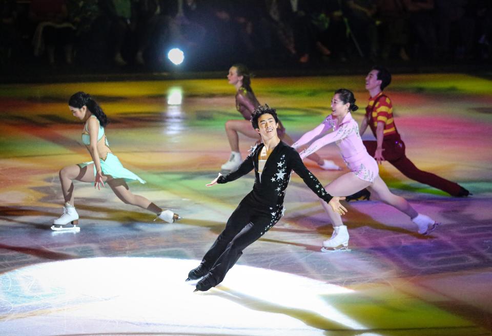 The cast of Stars on Ice performs a group number.