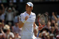 Great Britain's Andy Murray celebrates a point against Serbia's Novak Djokovic on day thirteen of the Wimbledon Championships at The All England Lawn Tennis and Croquet Club, Wimbledon.