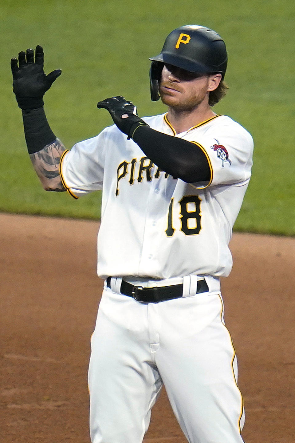 Pittsburgh Pirates' Ben Gamel celebrates on second base after driving in a run with a double off New York Yankees starting pitcher Jameson Taillon during the fourth inning of a baseball game in Pittsburgh, Tuesday, July 5, 2022. (AP Photo/Gene J. Puskar)