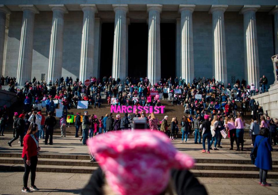 People gather on the steps of the Lincoln Memorial during the Women’s March.