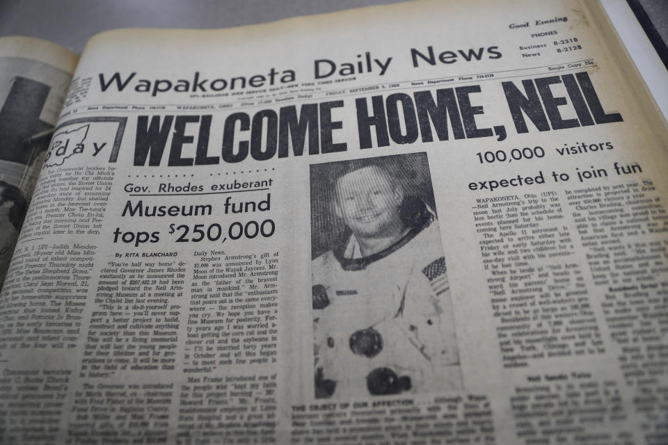 The front page of the Wapakoneta Daily News, dated Sept. 6, 1969, is photographed at the Auglaize County Public Library archives, Wednesday, June 26, 2019, in Wapakoneta, Ohio. Very down to earth about most things, folks in this small western Ohio city are over the moon as they get ready to celebrate the 50th anniversary of the day they watched their hometown hero along with the world. Neil Armstrong put Wapakoneta on the map in July 1969 when he became the first human to walk on the moon. (AP Photo/John Minchillo)