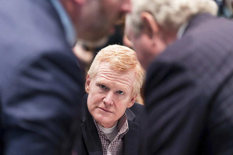 Alex Murdaugh listens as his defense attorneys Phillip Barber, left, and Dick Harpootlian confer during his trial at the Colleton County Courthouse in Walterboro, S.C., on Tuesday, Feb. 21, 2023. The 54-year-old attorney is standing trial on two counts of murder in the shootings of his wife and son at their Colleton County, S.C., home and hunting lodge on June 7, 2021. (Jeff Blake/The State via AP, Pool)