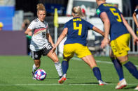 Linda Dallmann of Germany and Hanna Glas of Sweden battle for the ball during the 2019 FIFA Women's World Cup France Quarter Final match between Germany and Sweden at Roazhon Park on June 29, 2019 in Rennes, France. (Photo by TF-Images/Getty Images)