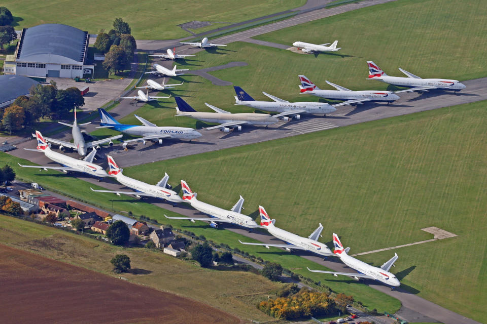 Aerial view of the runway at Kemble airfield where an airplane salvage company has a stock of many craft rendered unviable by the the consequences of Covid 19, October 12 2020. The tarmac is hosting 16 'Jumbos' (Boeing 747s) including the last of BA's fleet G-CIVB which landed here last week.