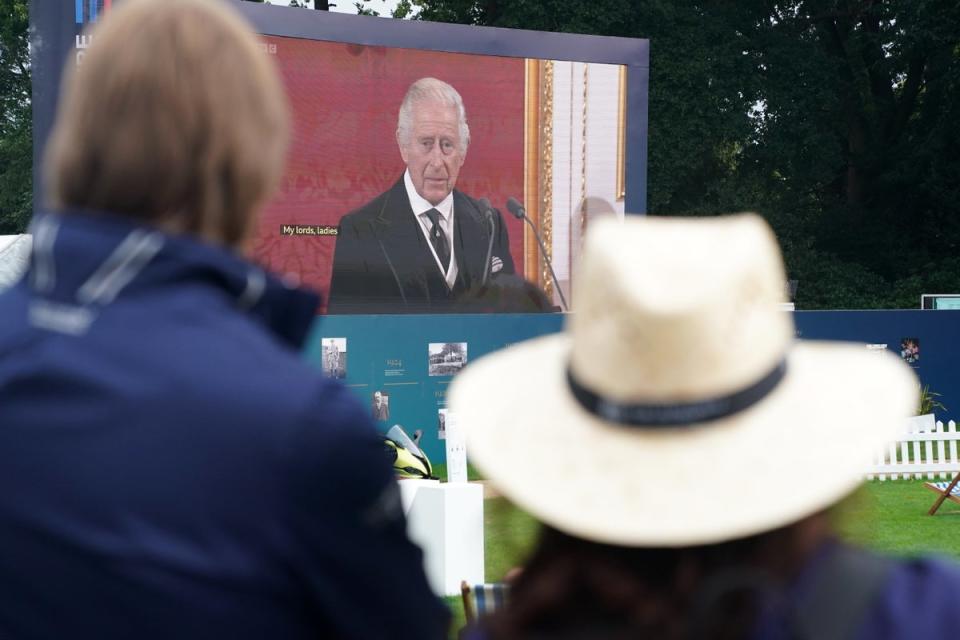 Spectators watch the Accession Council, where King Charles III was formally proclaimed monarch, on the big screen at Wentworth (Adam Davy/PA) (PA Wire)