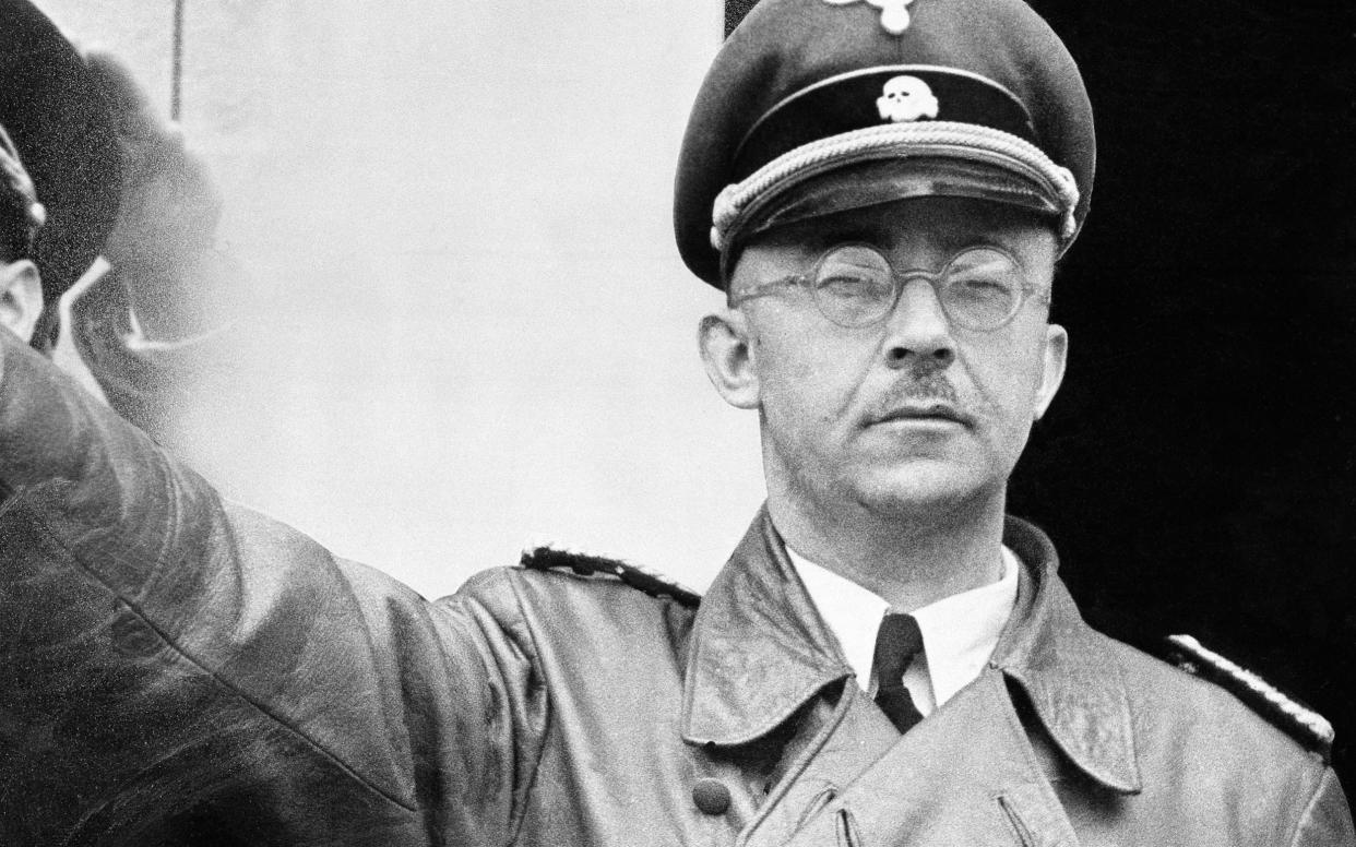 The calendar features portraits of 12 significant Nazi's, including Hitler and Himmler - str,/AP