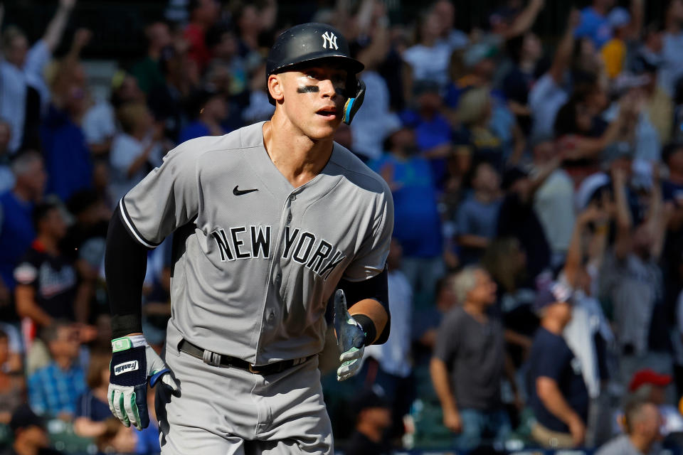 MILWAUKEE, WISCONSIN - SEPTEMBER 18: Aaron Judge #99 of the New York Yankees hits a home run in the seventh inning against the Milwaukee Brewers at American Family Field on September 18, 2022 in Milwaukee, Wisconsin. (Photo by John Fisher/Getty Images)