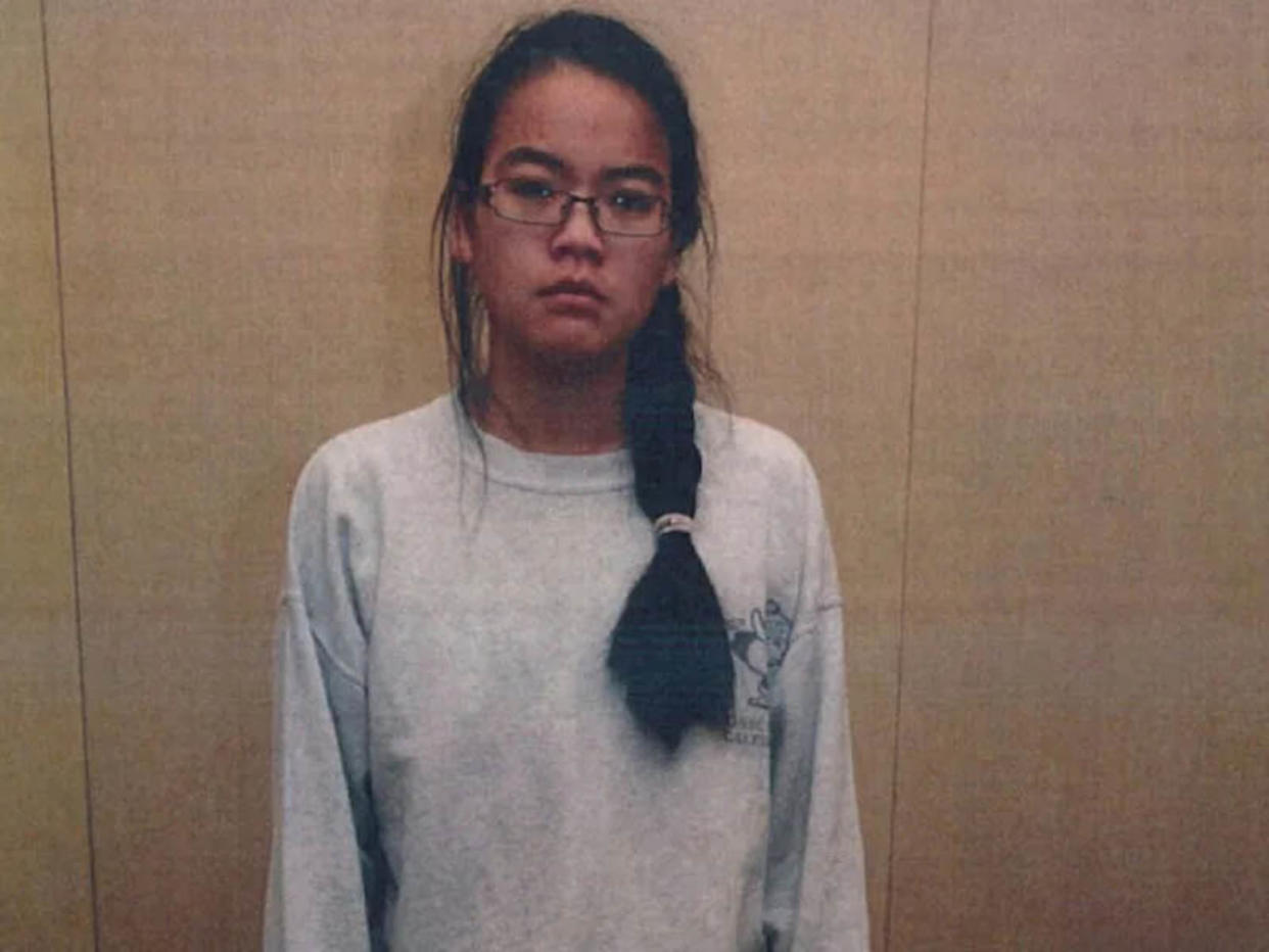 Jennifer Pan in a sweatshirt and glasses with her dark hair in long braid.  (Courtesy Netflix)