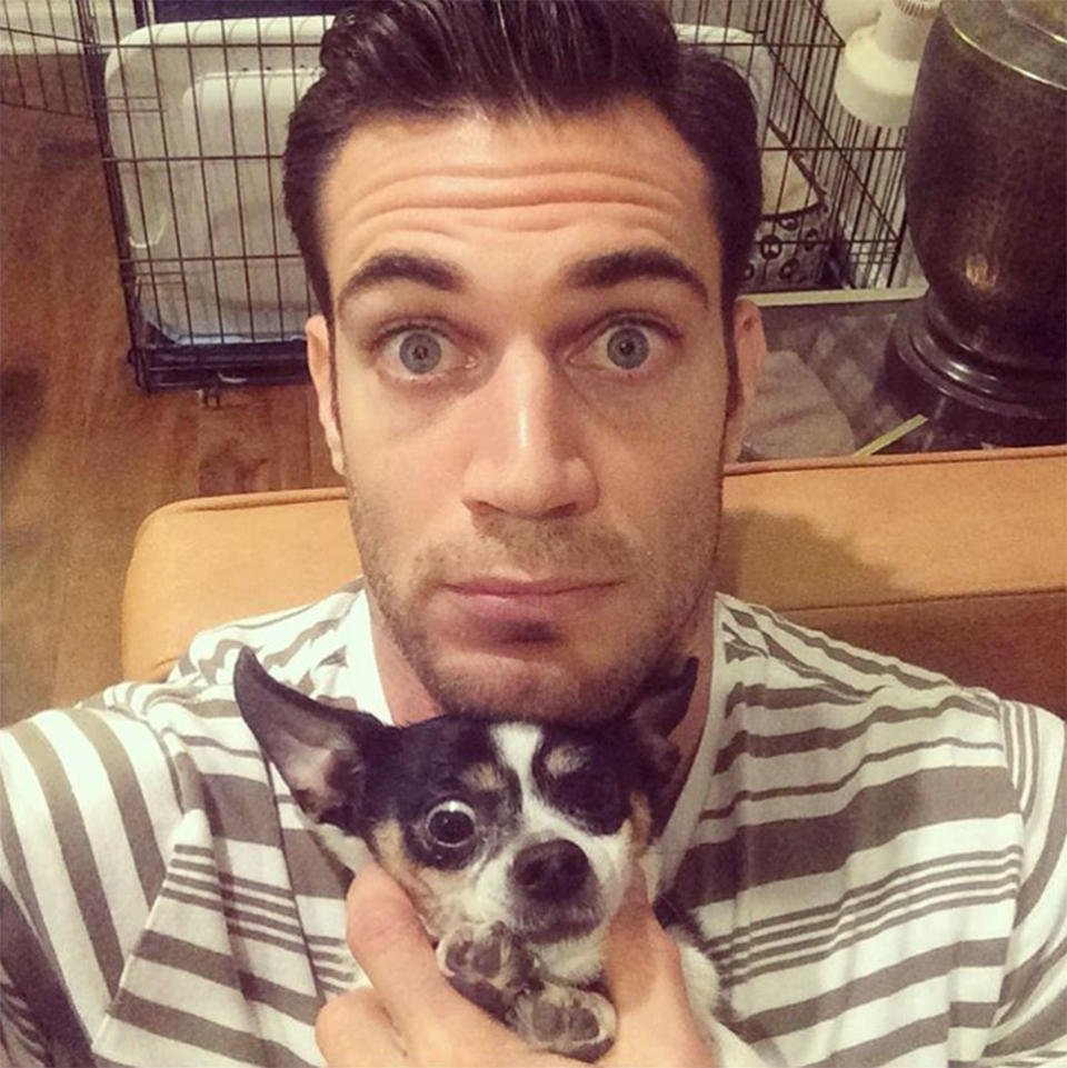 <p>Taking a "pelfie" (pet + selfie) with his own pup, rescue Chihuahua Henry. </p>