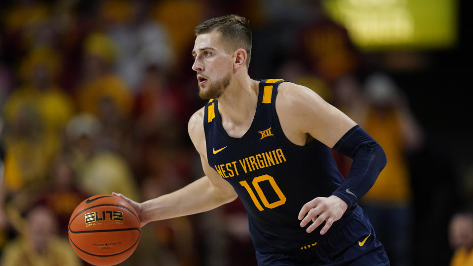 West Virginia guard Erik Stevenson drives up court during an NCAA college basketball game against Iowa State, Monday, Feb. 27, 2023, in Ames, Iowa. (AP Photo/Charlie Neibergall)