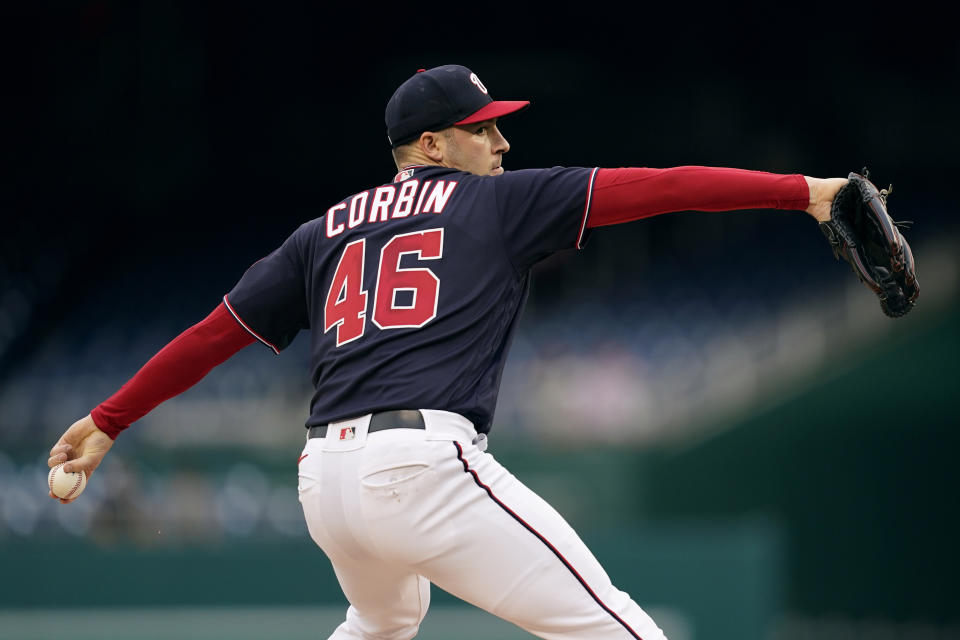 Washington Nationals starting pitcher Patrick Corbin throws to the Colorado Rockies in the first inning of a baseball game, Thursday, May 26, 2022, in Washington. (AP Photo/Patrick Semansky)