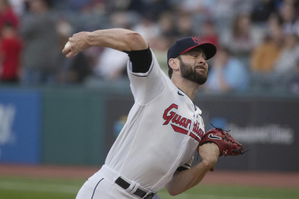 Cleveland Guardians starting pitcher Lucas Giolito delivers to a Texas Rangers batter during the first inning of a baseball game in Cleveland, Friday, Sept. 15, 2023. (AP Photo/Phil Long)