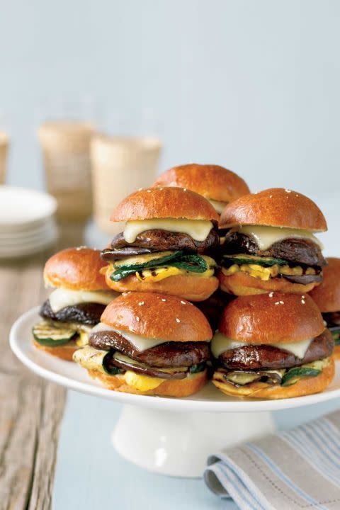 <p>Grilled mini portobello burgers offer vegetarians a savory option for the main course. But you might want to make extra—they look so good that meat lovers might snag one, too!</p><p><strong><a href="https://www.countryliving.com/food-drinks/recipes/a1957/mini-portobello-burgers-clv0707/" rel="nofollow noopener" target="_blank" data-ylk="slk:Get the recipe" class="link ">Get the recipe</a>.</strong></p>